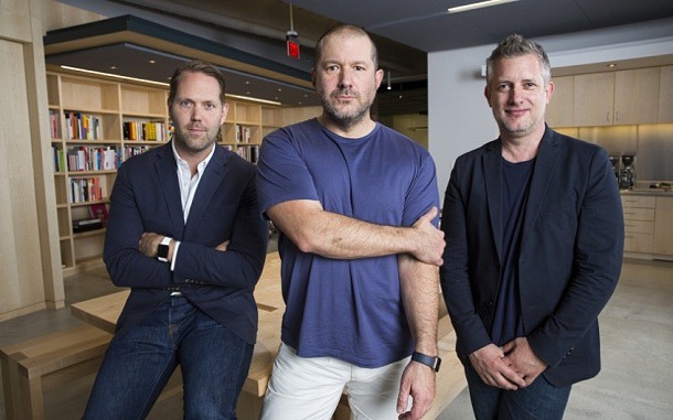 Fea0062665    Jonathan Ive- purple/blue shirt Alan Dye - taller gentleman Richard Howarth - shorter, blue t-shirt and blazer  Apple executives Tim Cook and Jonathan Ive.